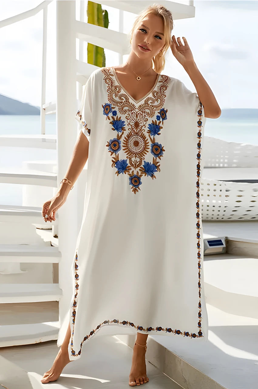 Aylen white embroidered kaftan styled at seaside, front pose