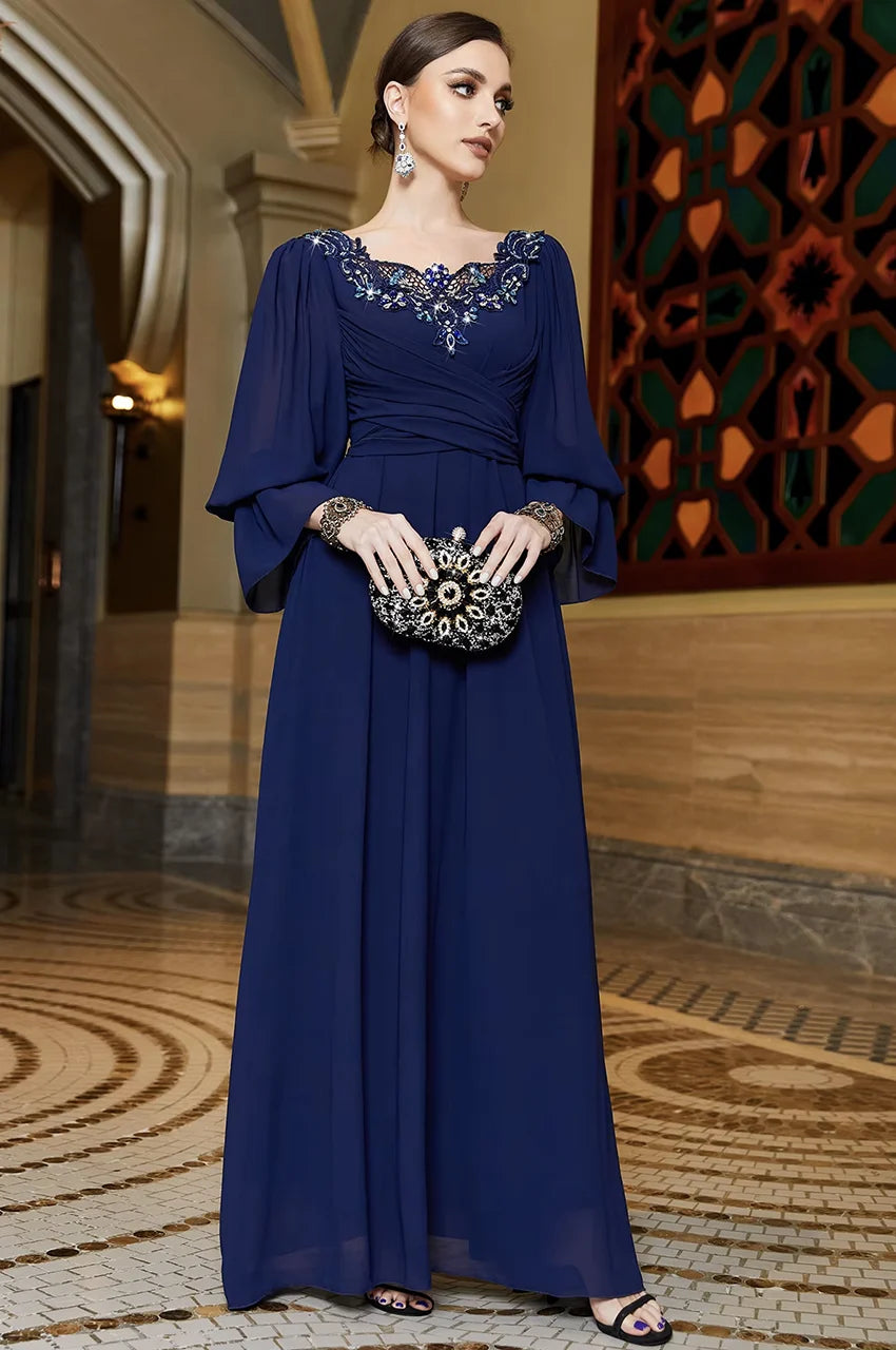 Elegant evening styling of Aylin navy blue kaftan with accessories