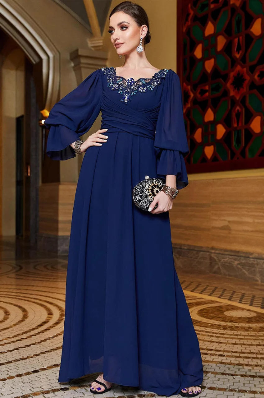 Detailed front view of Aylin navy blue kaftan with ruched waist and embellished neckline