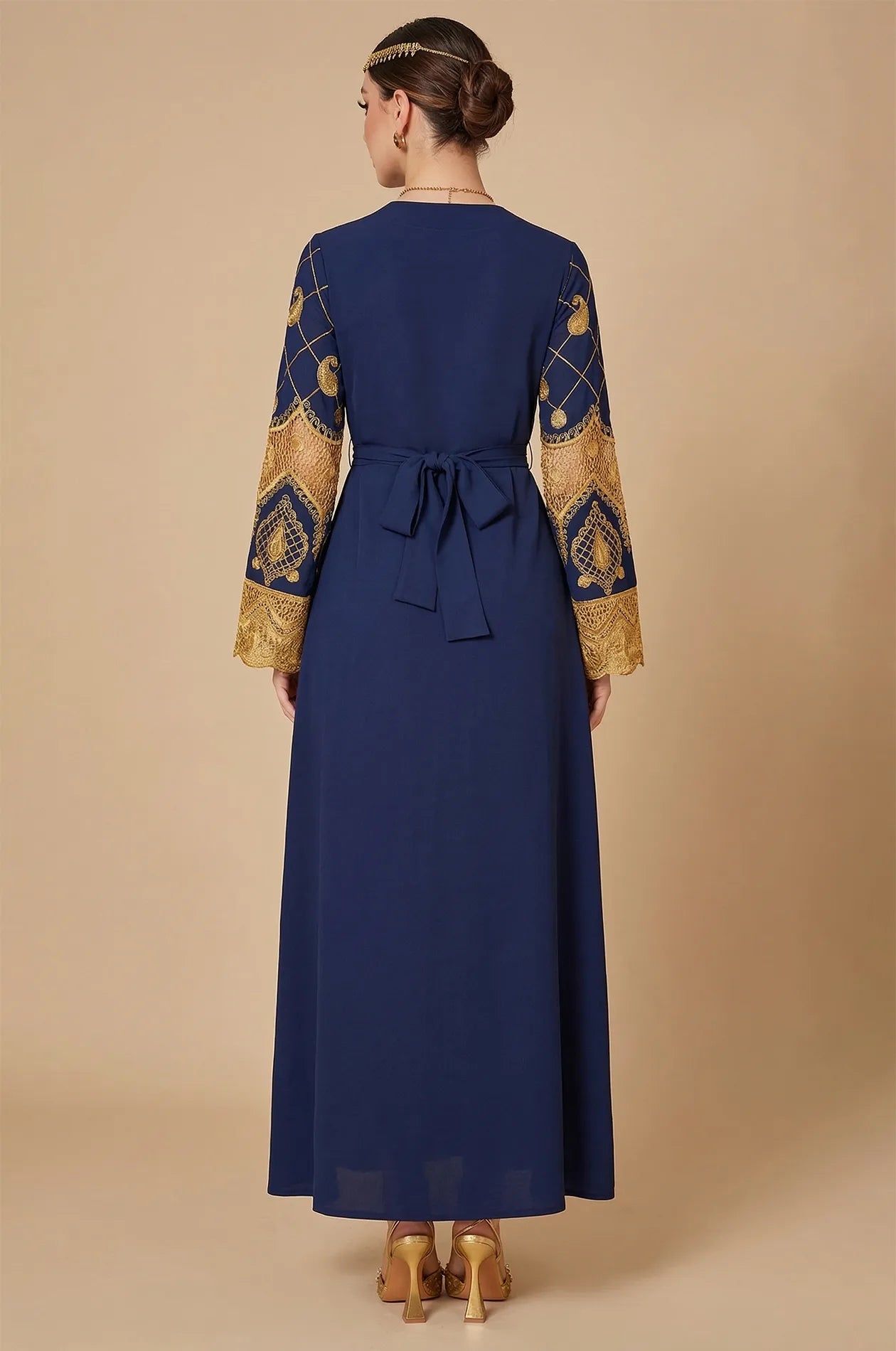 Back view of the Aysel kaftan showing the waist tie and clean floor-length drape.