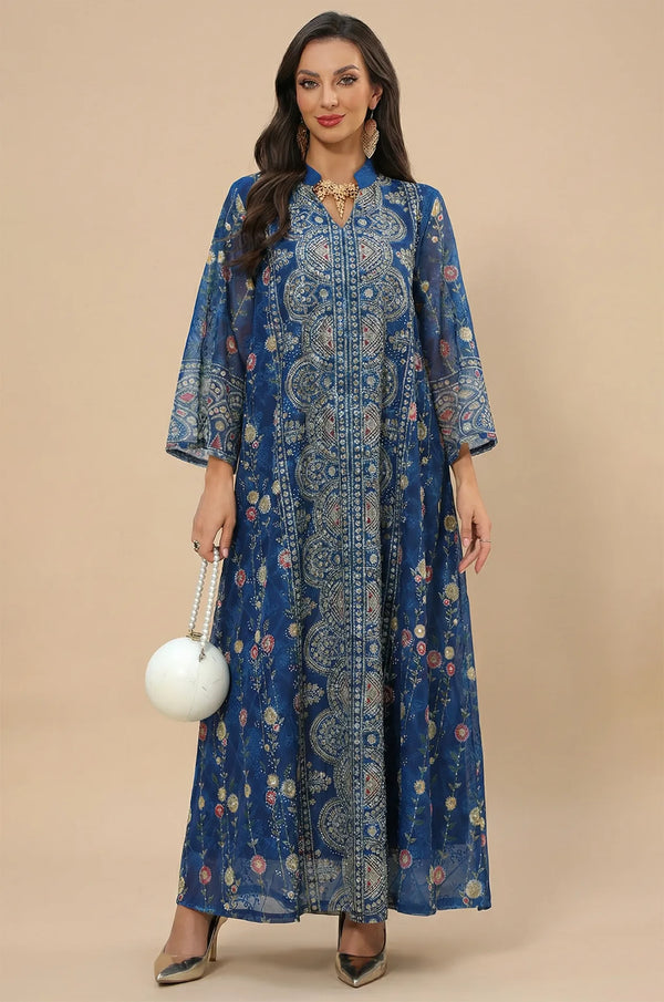 Full front view of the Azari navy chiffon kaftan maxi dress featuring golden floral motifs and a white pearl ball clutch.