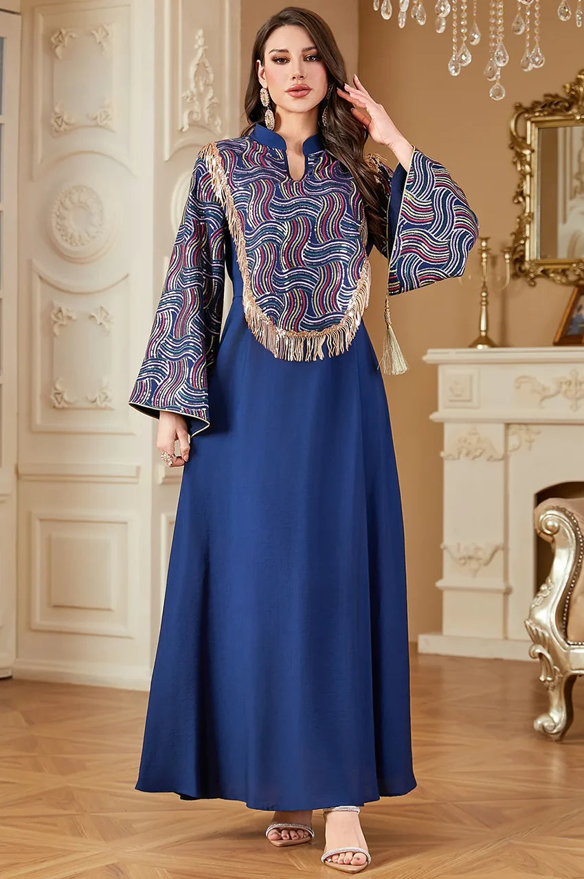Front view of Aziah navy blue kaftan with colorful wave embroidery.