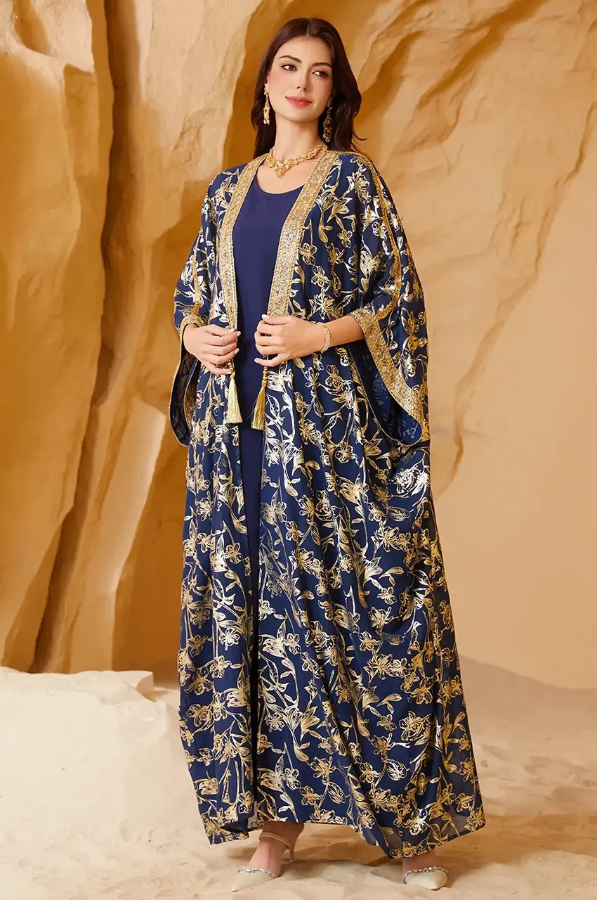 AZIRI navy long open kaftan styled with the matching embellished tie-waist belt for a cinched fit.