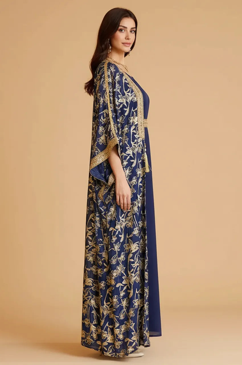 Side profile showcasing the voluminous butterfly sleeve drape of the navy long open kaftan.