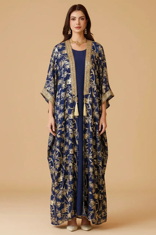 Professional studio shot of the AZIRI navy long open kaftan highlighting the rich navy and gold contrast.