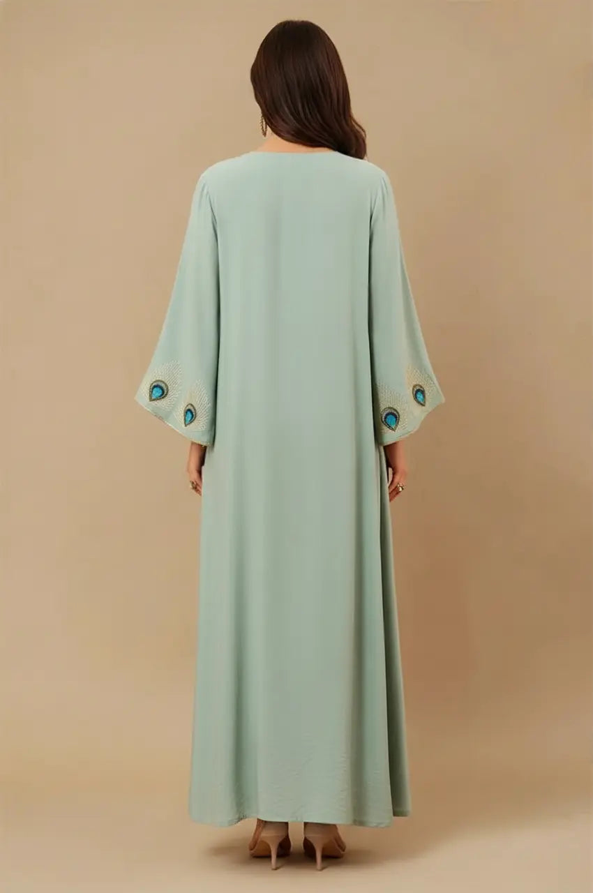Back view of Azura Green Peacock Kaftan with embroidered sleeve accents