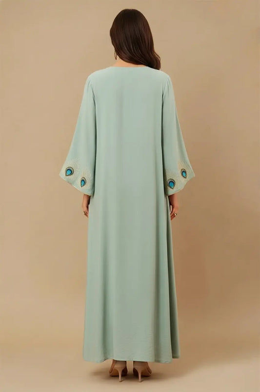 Back view of Azura Green Peacock Kaftan with embroidered sleeve accents
