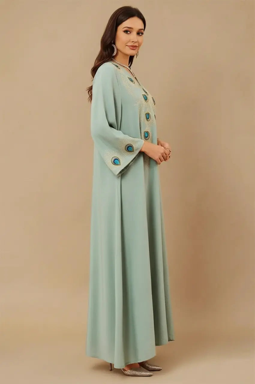 Side profile of Azura Green Peacock Kaftan highlighting embroidered sleeves