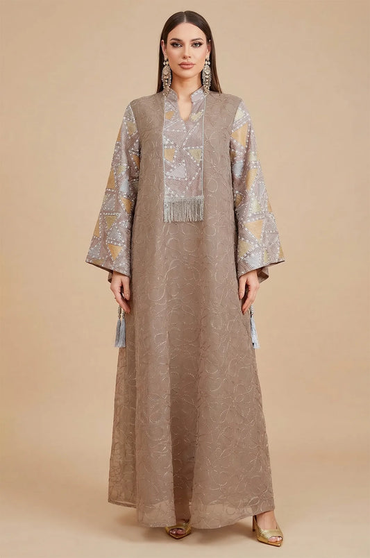 Front view of the Brown Kaliera, a modest geometric kaftan perfect for formal events, showing the V-neckline and silver fringe tassel.
