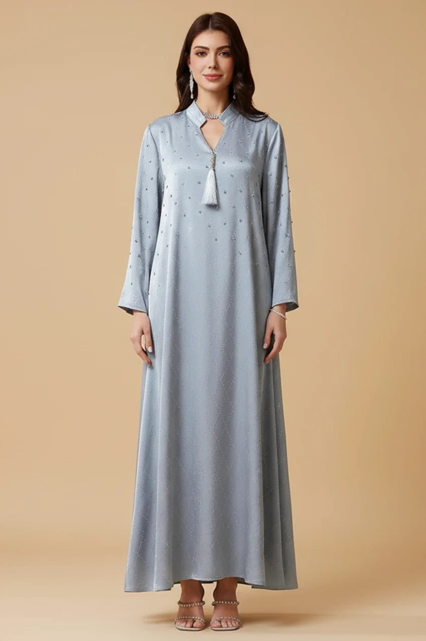Full length view of Elani lavender gray kaftan showing fluid satin drape and wide sleeves.