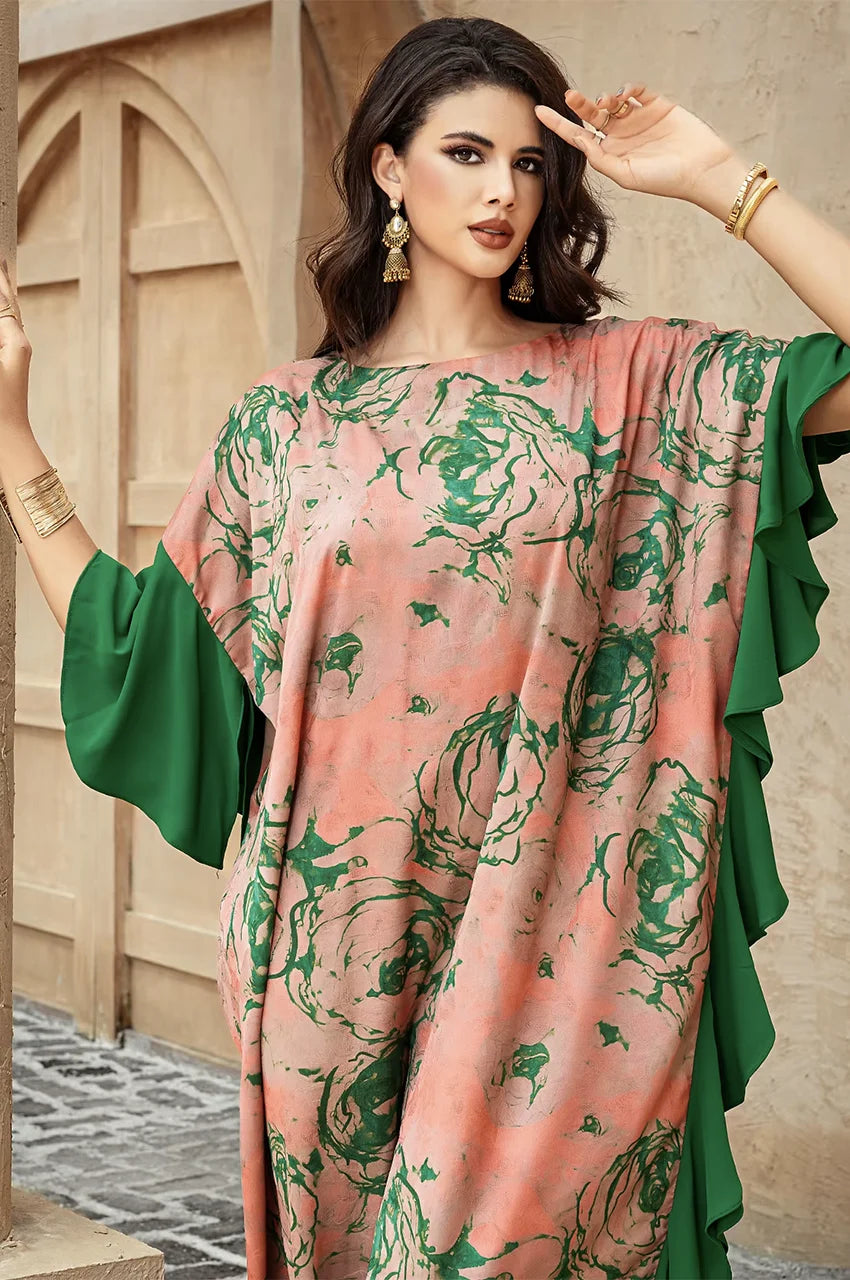 Close-up of green floral prints on Elara beige kaftan