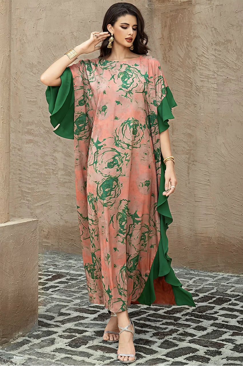 Model posing in Elara beige and green floral kaftan