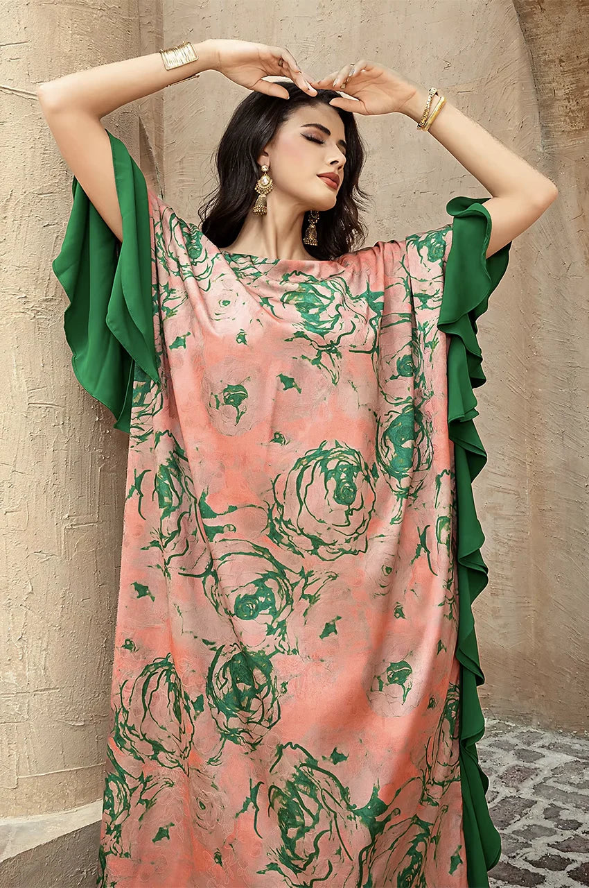 Detail of layered green sleeves on Elara kaftan