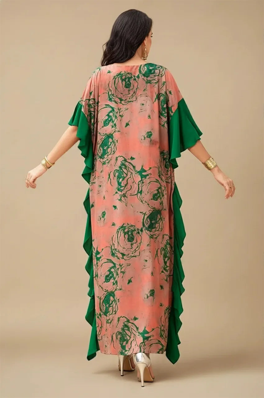 Back view of Elara floral kaftan maxi dress in peach and green