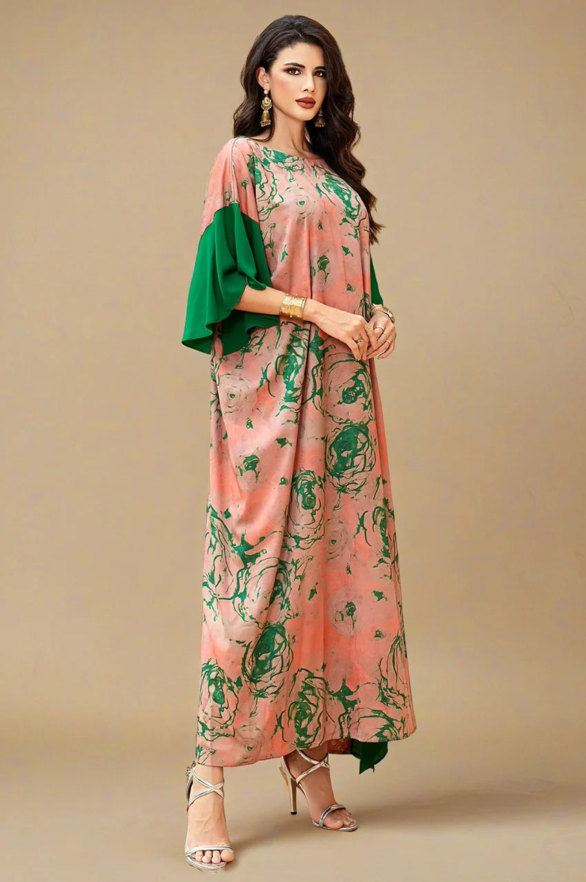 Elara floral kaftan maxi dress in peach and green angled portrait view