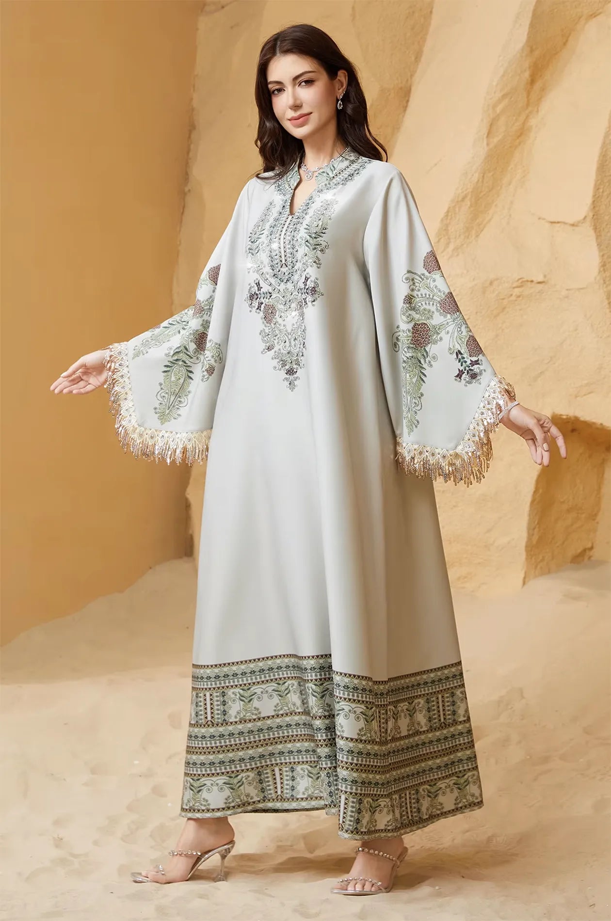 Wide shot of the Eliah embellished kaftan showing the intricate hemline border.
