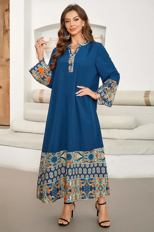 Full body fashion shot of the Elyah indigo kaftan by Naylara