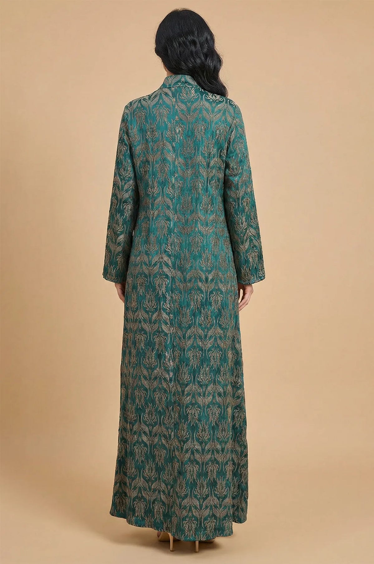 Back view of the Farah green kaftan showing the continuous damask print pattern.
