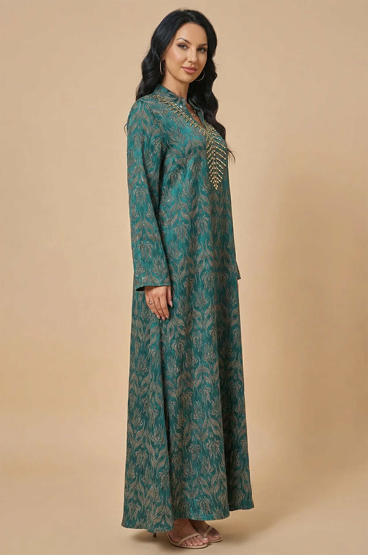 Side profile of the Farah jeweled kaftan highlighting the sleeve length and flowy fit.