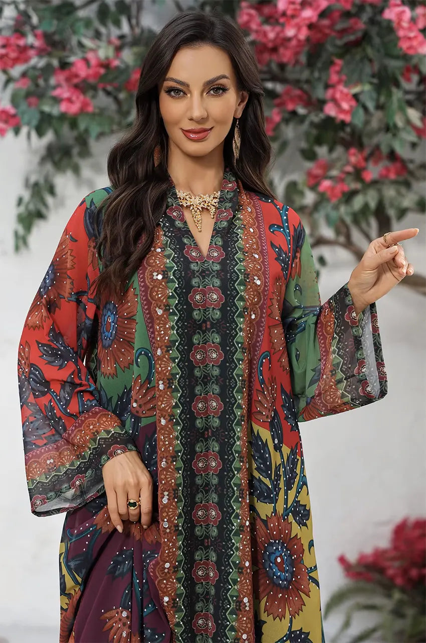 Close-up of the V-neckline and floral print details of the Fariya colorful kaftan.