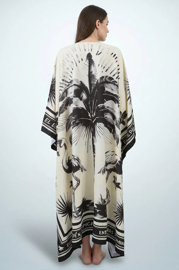 Back view of black and cream flamingo print maxi kaftan