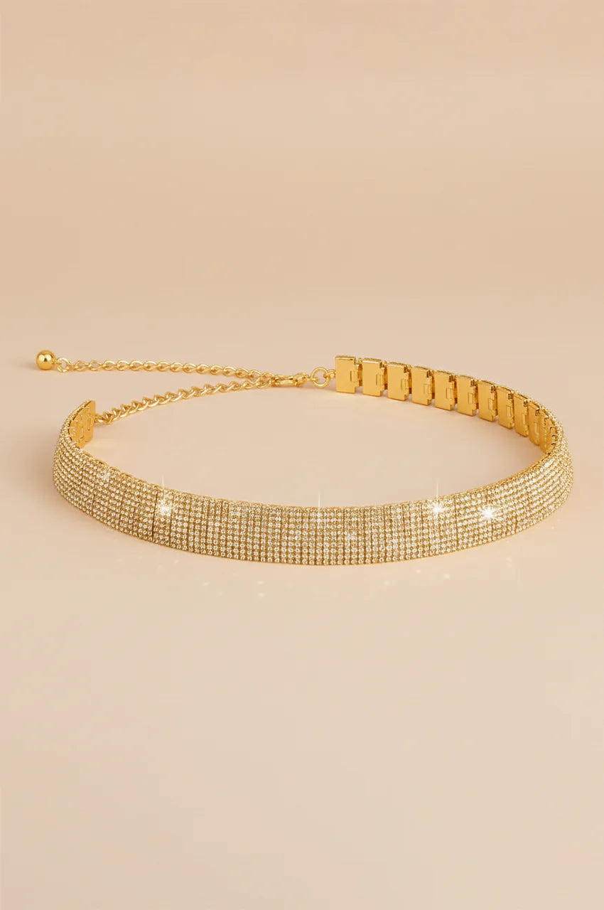 Side view of gold rhinestone belt showing the multi-row crystal setting.
