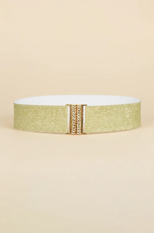 Front view of Naylara gold glitter elastic waist belt featuring a rhinestone interlocking buckle.