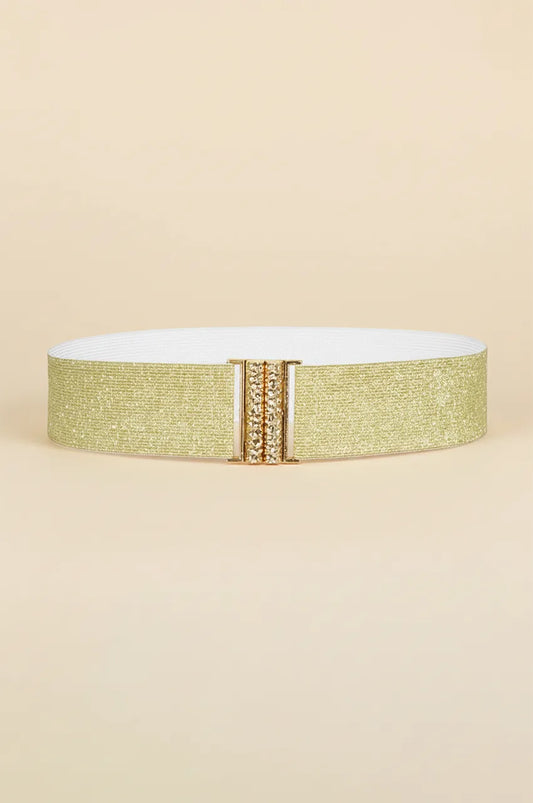 Front view of Naylara gold glitter elastic waist belt featuring a rhinestone interlocking buckle.