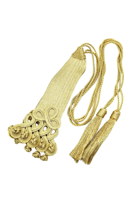 Gold embroidered sash belt folded to showcase the metallic texture and tassel ends.