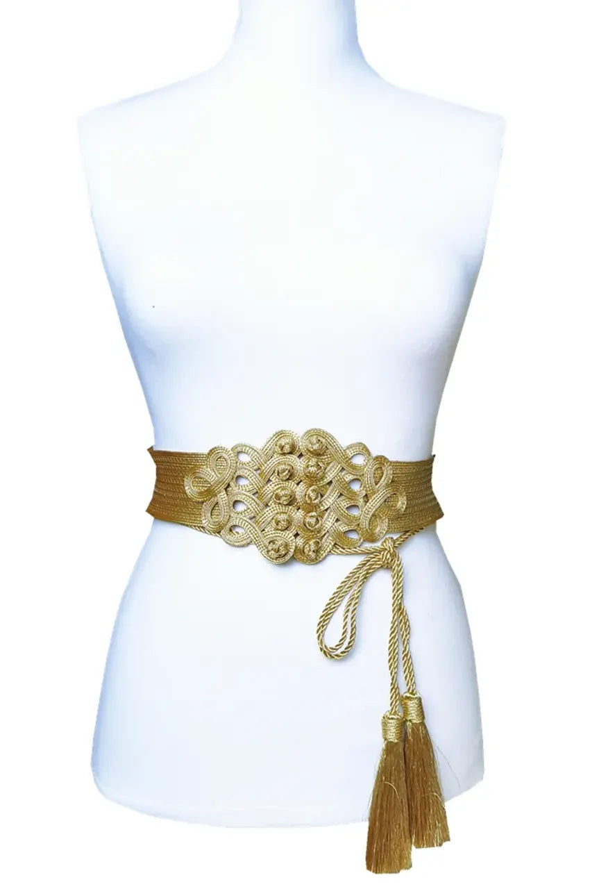 Wide gold cord belt styled on a white mannequin showing waist definition.