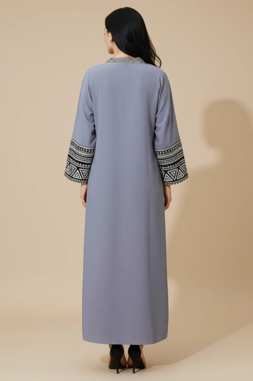 Back view of Keyla gray kaftan showing flowing silhouette and sleeve detail.