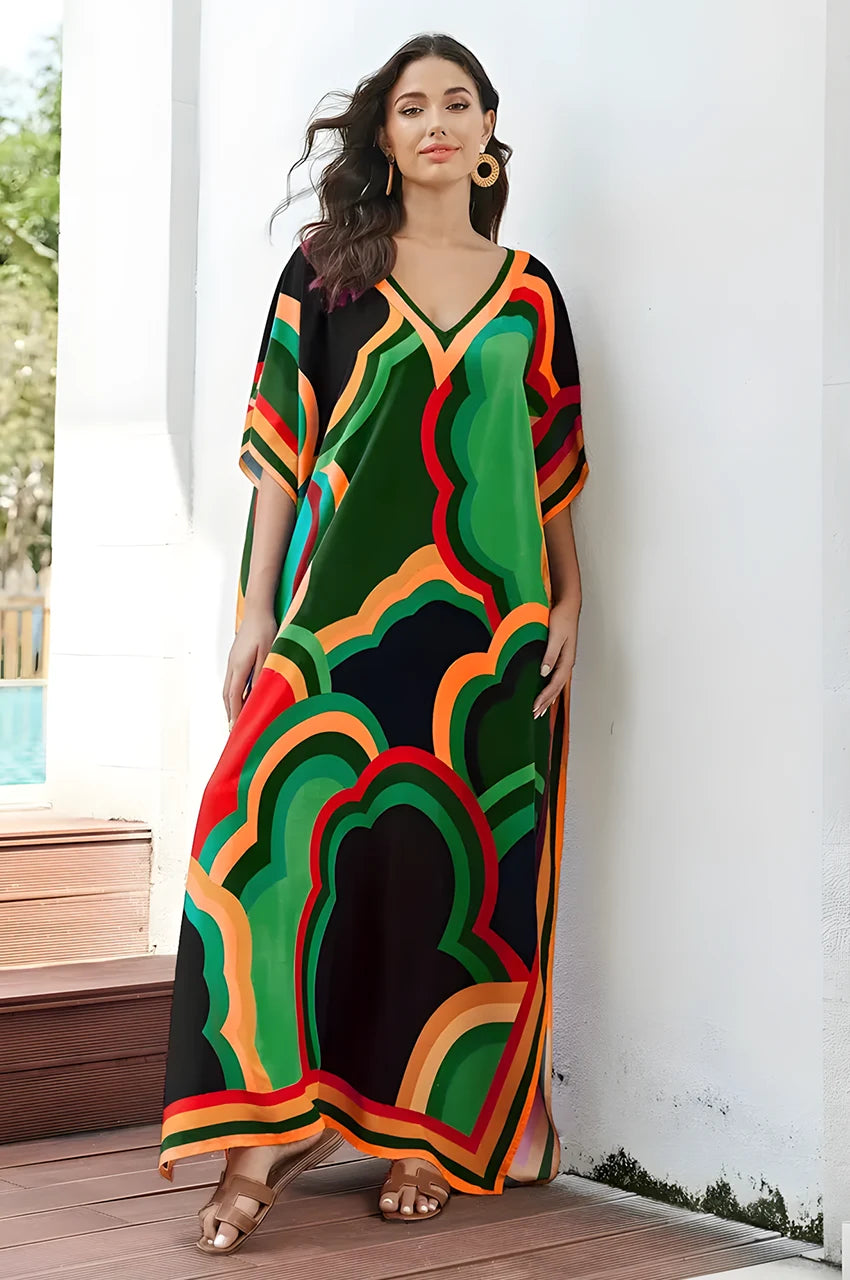 Full length green colorful resort kaftan dress with flowing fabric