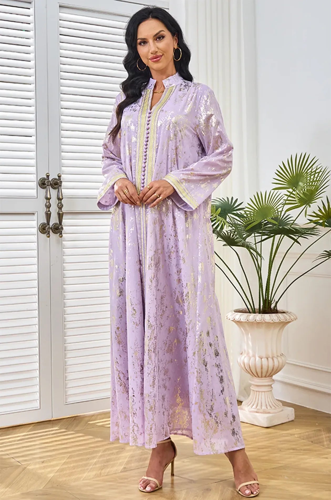 Elegant pose highlighting the fluid drape of the Halim party kaftan.