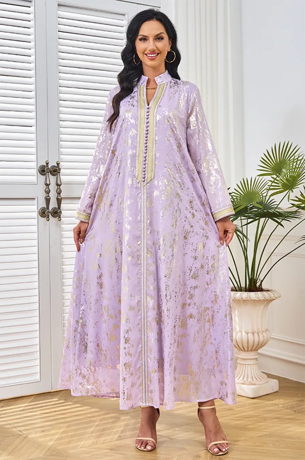 Full-length shot of the Halim lilac and gold metallic kaftan.