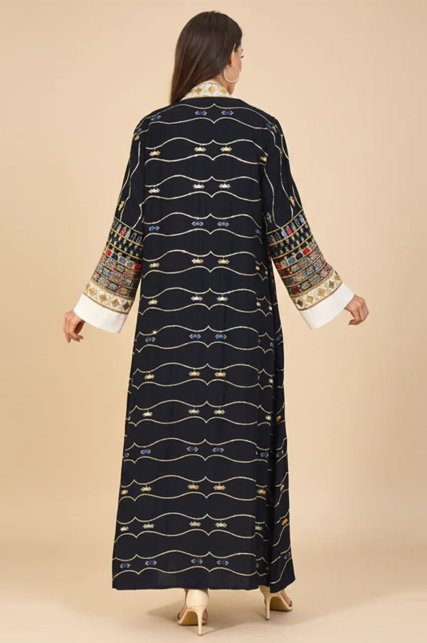 Back view of the floor-sweeping HALIYA black plus size sequin kaftan showing the relaxed modest fit.