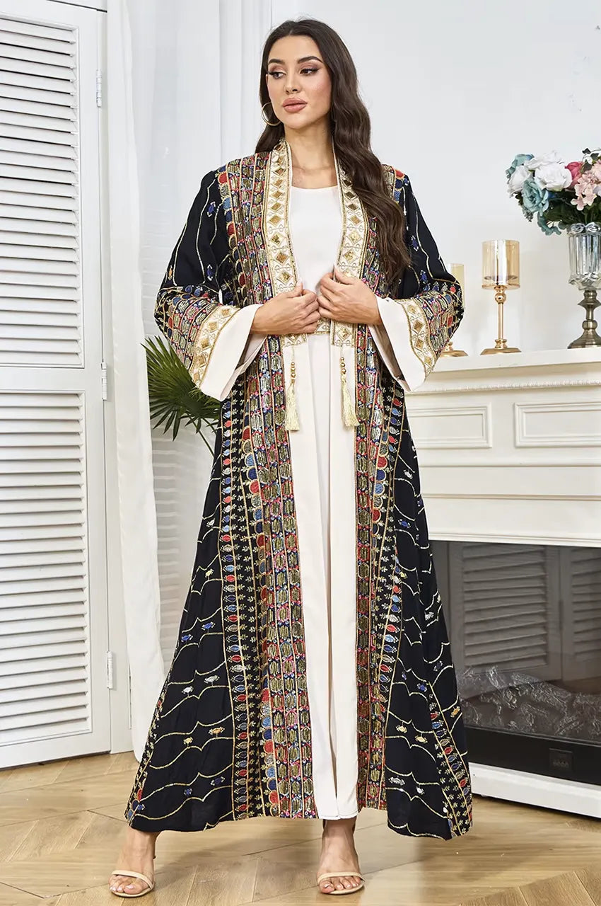 Macro view of the premium lightweight crepe-blend fabric on the HALIYA black plus size sequin kaftan.