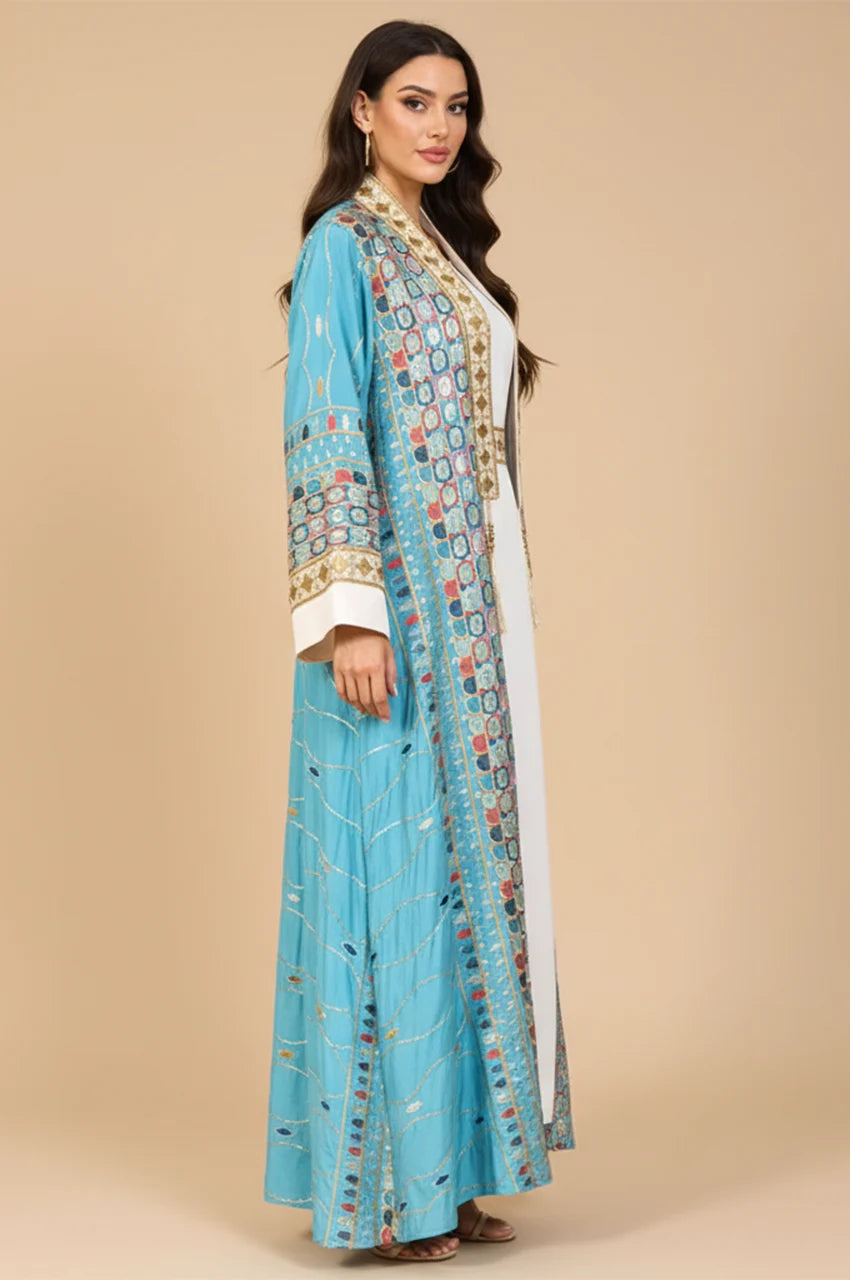 Side profile of the sky blue plus size sequin kaftan highlighting the 2-piece layering over the white slip.