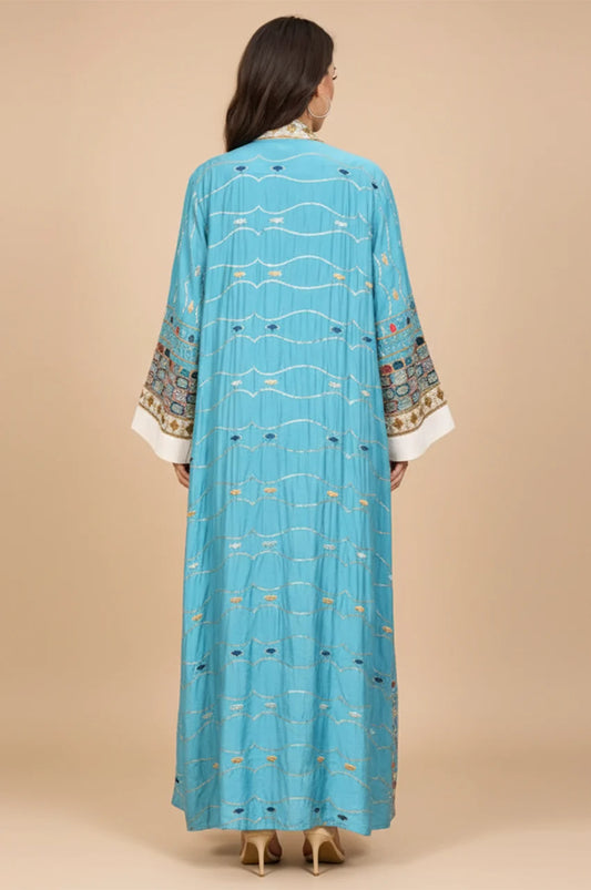 Back view of Haliya Sky Blue plus size sequin kaftan showing gold horizontal thread details and structured cut.
