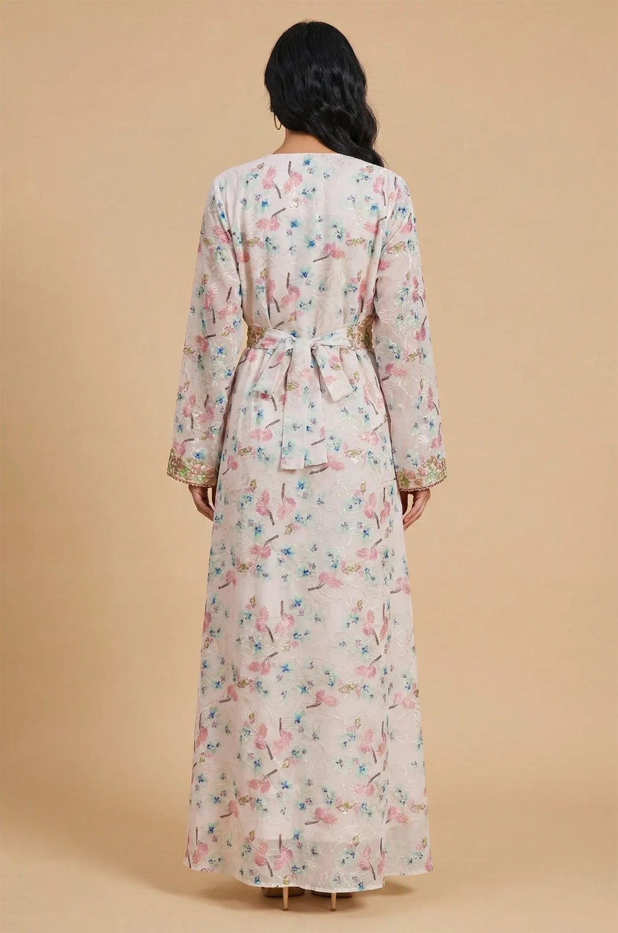 Rear view of the Ilani kaftan showing the fabric tie-back and floral pattern consistency.