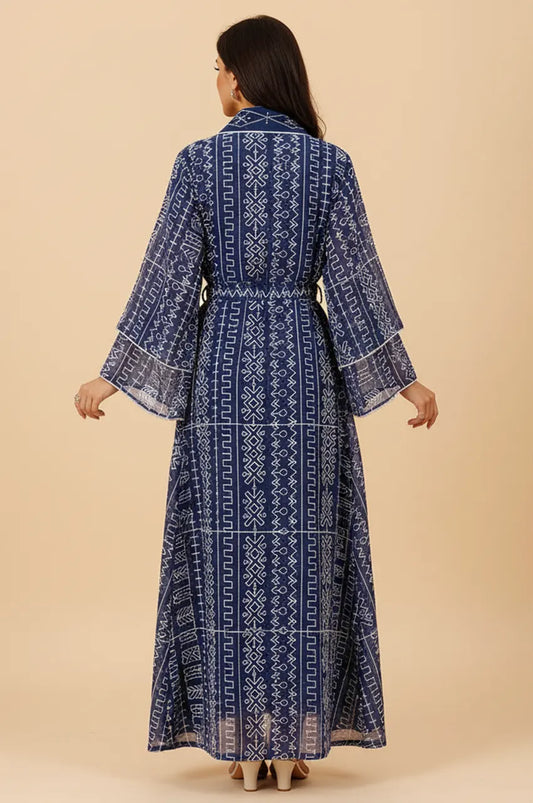 Back view of the Ilyah midnight blue kaftan displaying the vertical geometric embroidery pattern.