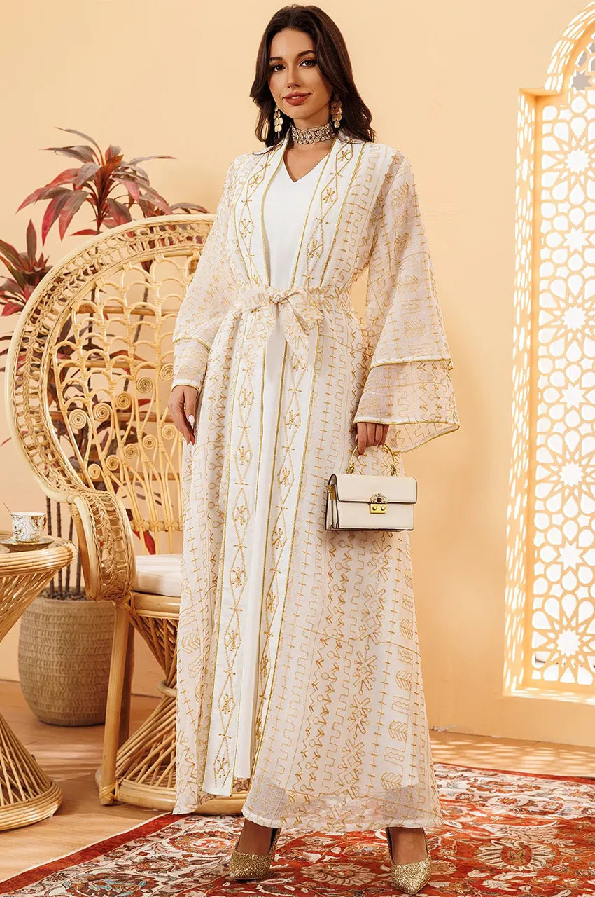 ILYAH ivory white embroidered belted kaftan dress styled for a formal wedding guest look.