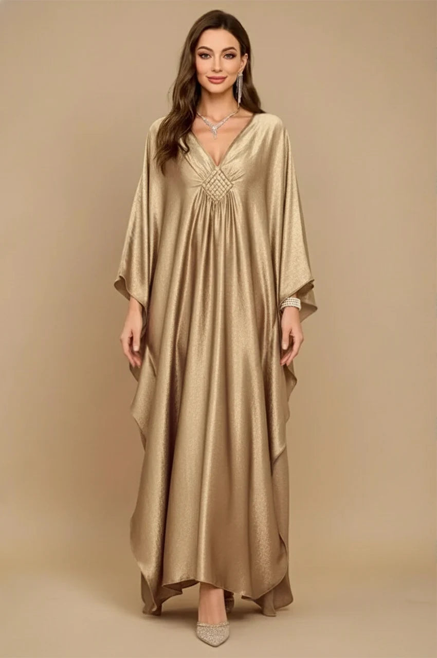 Front view of Inara gold batwing kaftan with gathered neckline and elegant drape