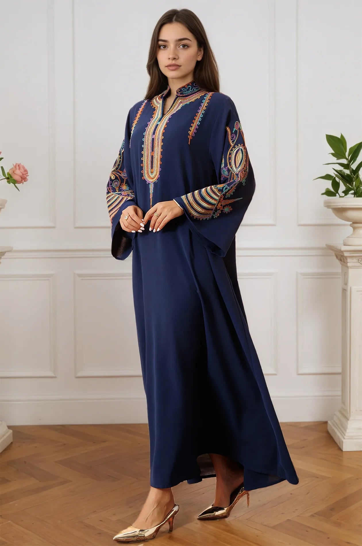 Model in motion wearing the Inez Blue Jalabiya Kaftan, emphasizing the movement of the lightweight material.