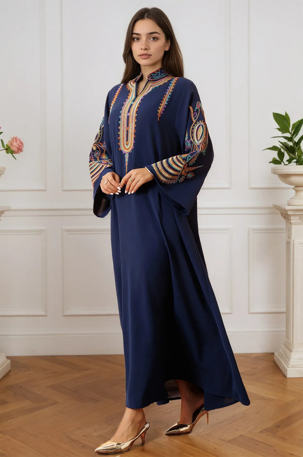 Model in motion wearing the Inez Blue Jalabiya Kaftan, emphasizing the movement of the lightweight material.