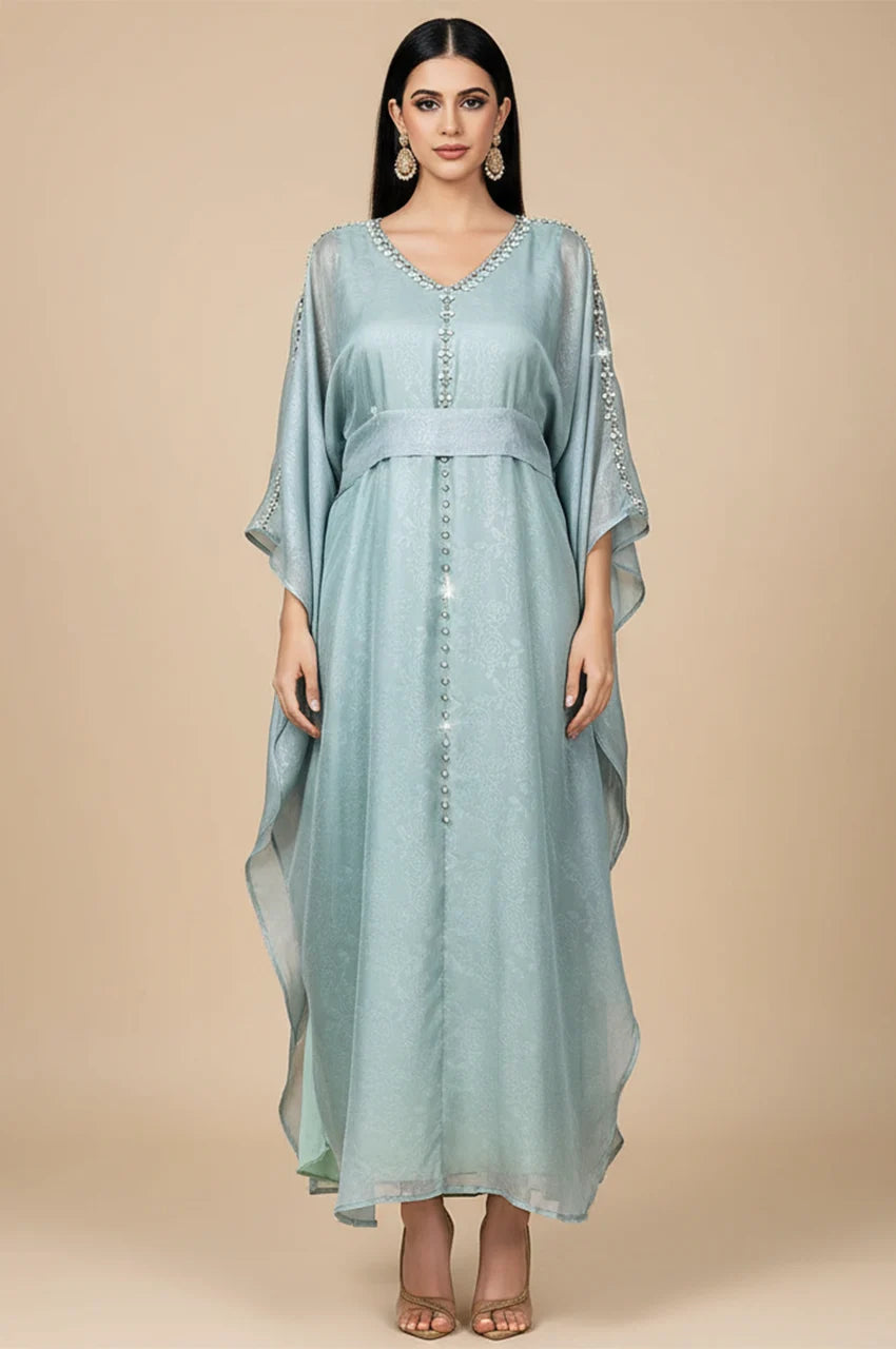 Full front view of Jalya light blue Moroccan kaftan with silver embellishments