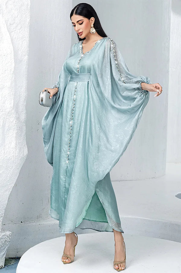 Full length shot of the Jalya light blue kaftan showing the split hem
