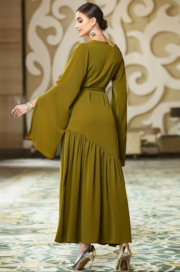Back and side angle of the Kairin kaftan showing the sleeve detailing and silhouette.