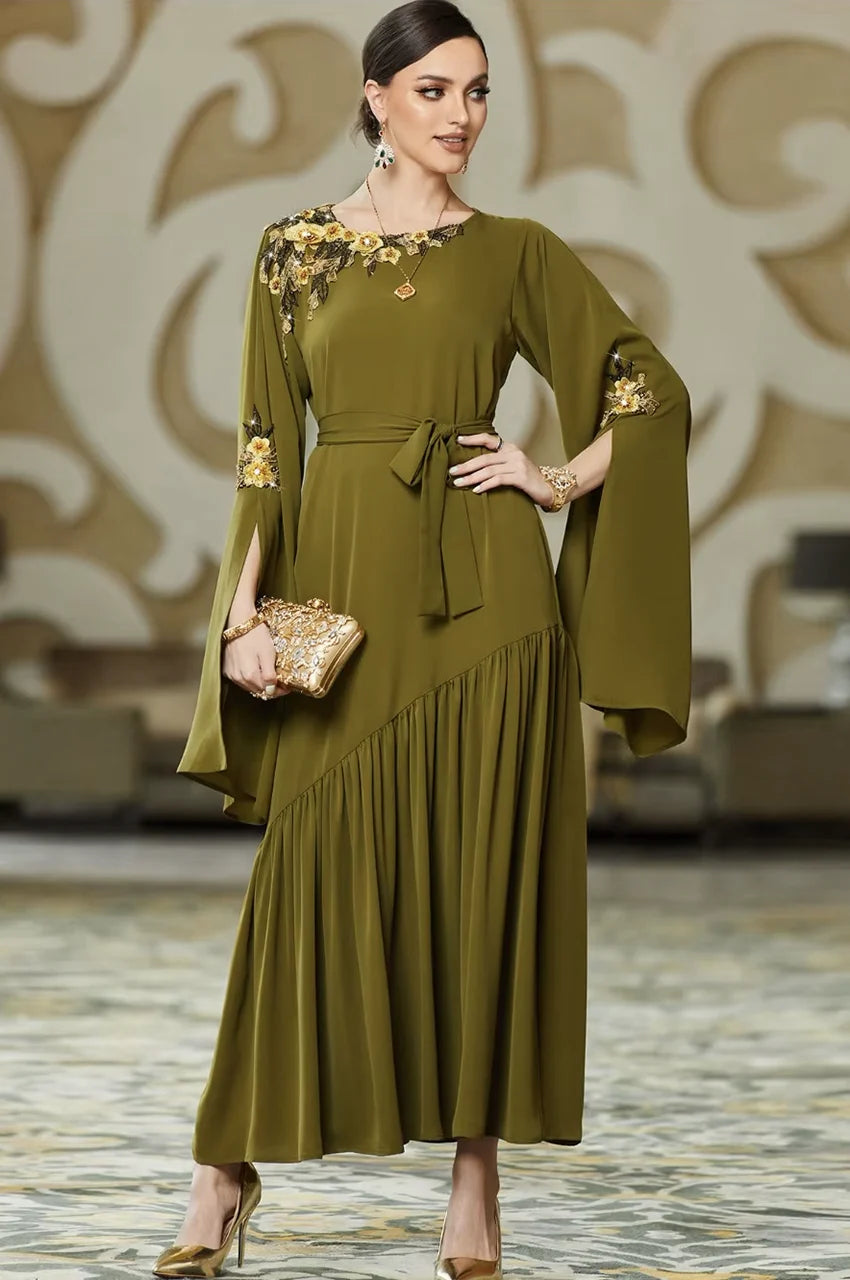 Elegant pose showing the drape and fit of the Kairin maxi dress by Naylara.