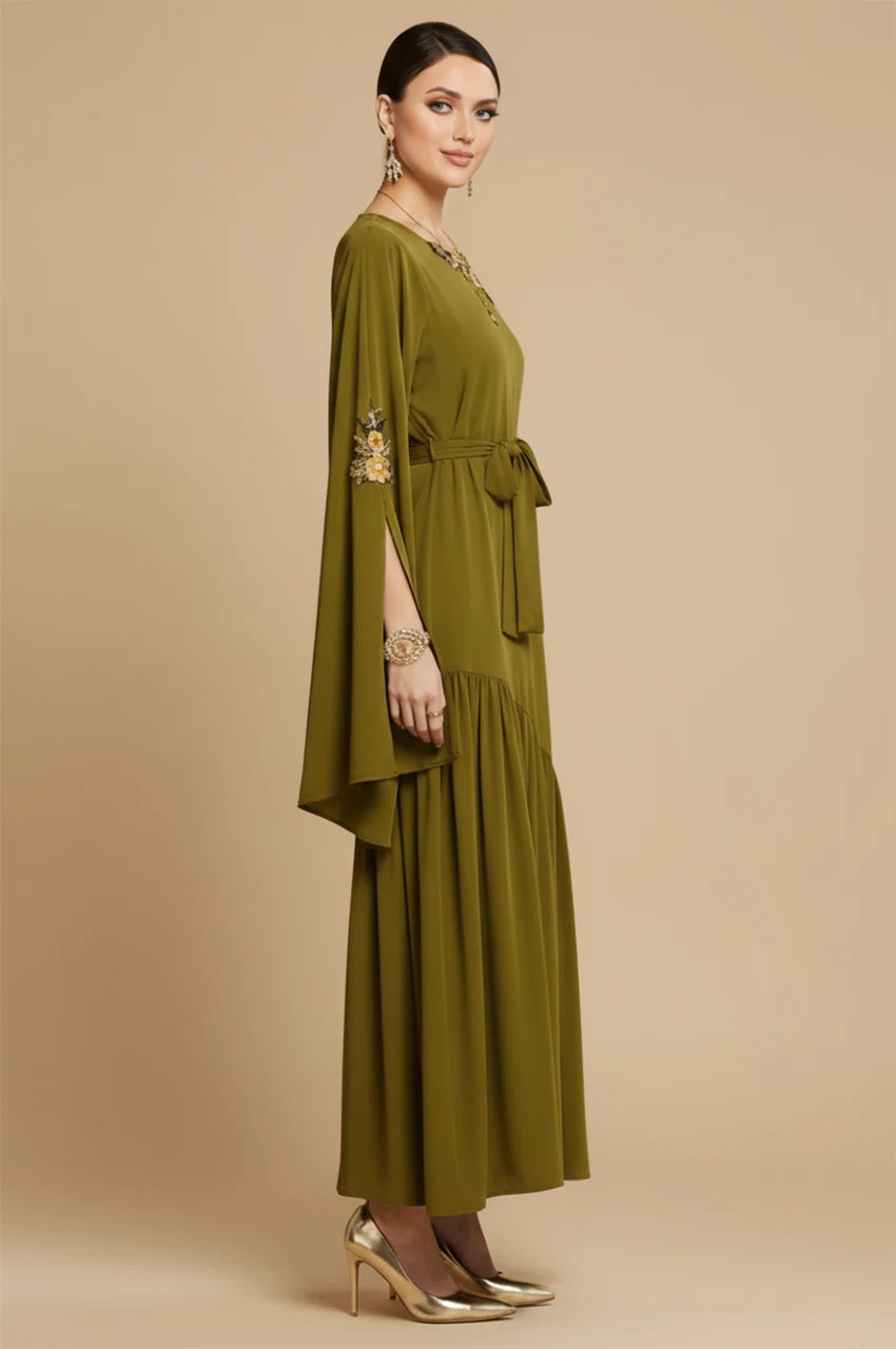Side profile view of the Kairin dress highlighting the split sleeve design.