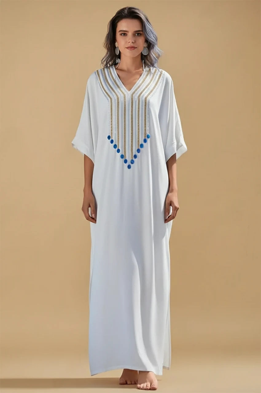 White Greek kaftan Kalila with gold embroidery and blue beads front view